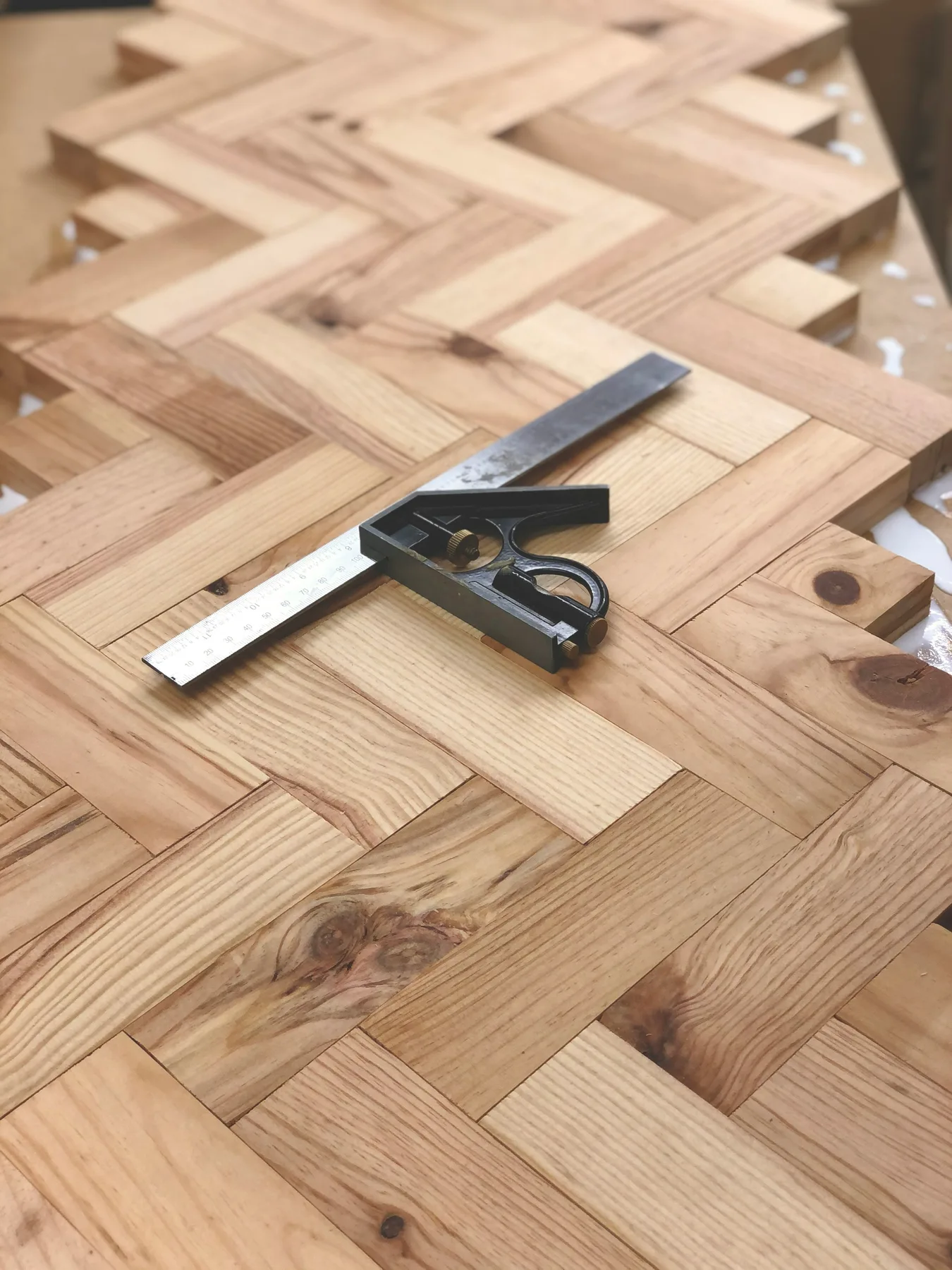 Herringbone parquet wood flooring installation